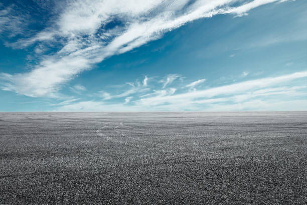 istock Asphalt road circuit and sky clouds with car tire brake 861121884