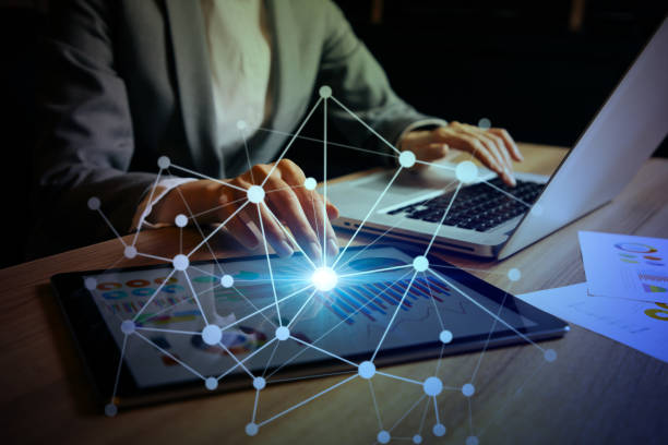 istock businesswoman using digital devices. IoT(Internet of Things). ICT(Information Communication Technology). mixed media. 861122560