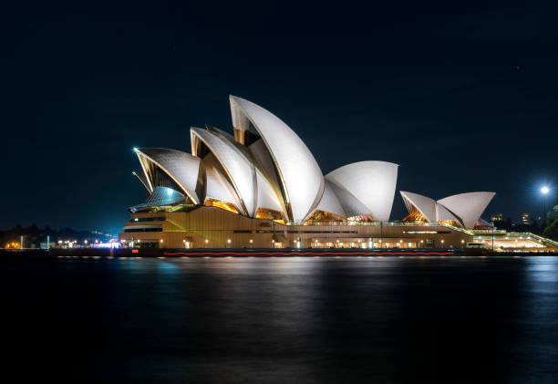 Sydney Opera House Sydney, Australia - March 11, 2017: Sydney Harbour Bridge and Opera House at Night opera house stock pictures, royalty-free photos & images