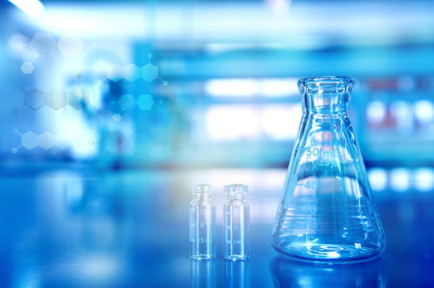 istock blue glass flask with vial in research chemistry science laboratory background 861126496
