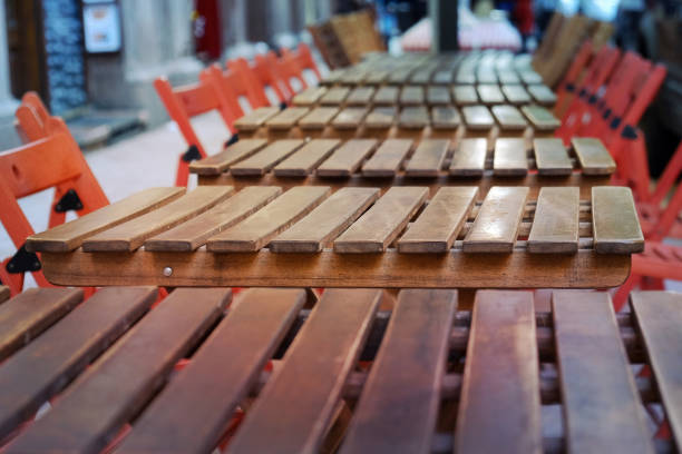 istock Row of empty cafe tables and chairs 861129856