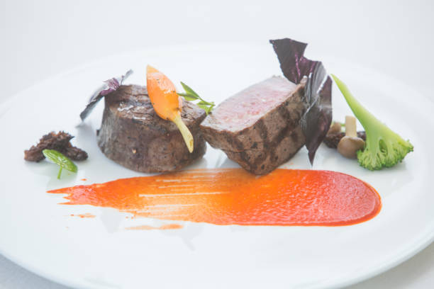 istock Fillet mignon with sauce and vegetables 861129902