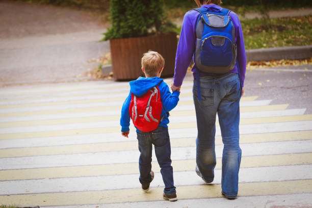istock father and son go to school, education 861132862