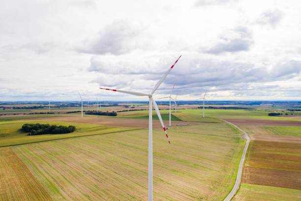 istock Aerial drone view on wind electricity generator 861136962