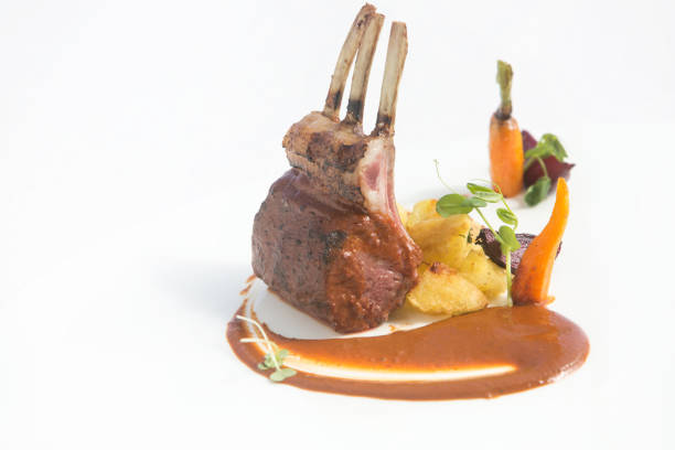 istock Roasted lamb ribs with sauce and vegetables 861143182