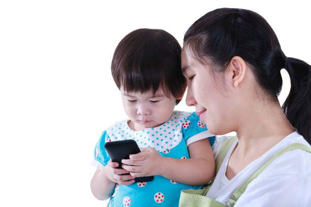 istock Mother with her daughter. Girl using electronic gadget. Isolated on white background. 861148746