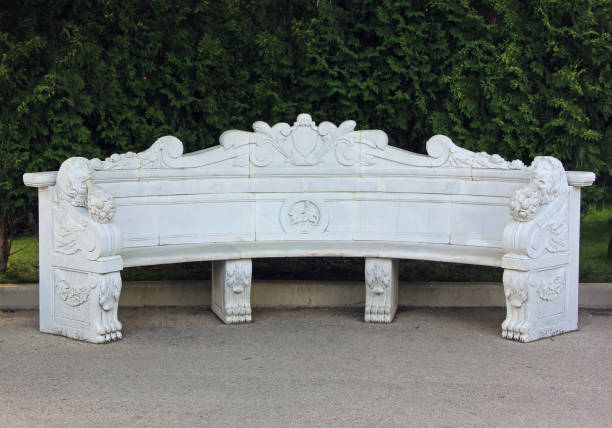 Beautiful white stone bench in the Park.