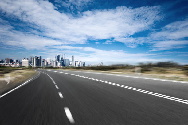 istock empty asphalt road with cityscape of modern city 861165004
