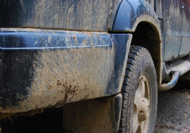 istock Dirty side of a black car after 861175440