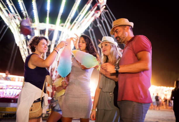 istock Sharing cotton candy at amusement park 861176522