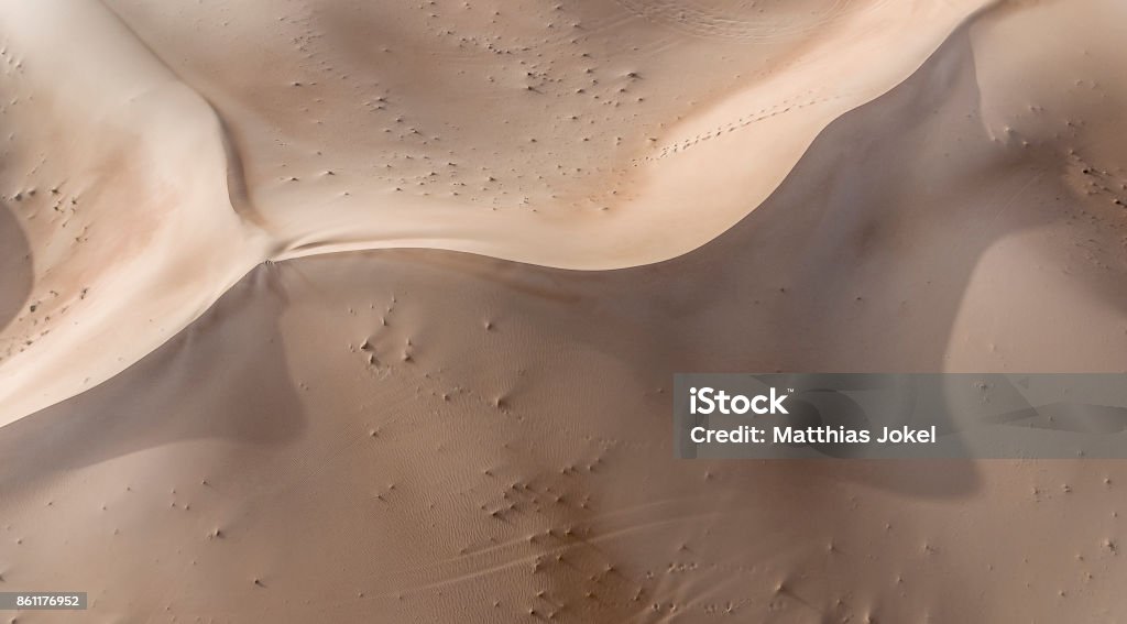 Sand Dune Shot of a sand dune in Abu Dhabi Aerial View Stock Photo