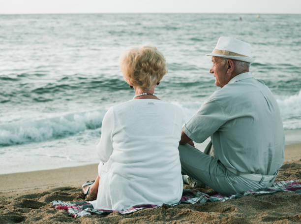 istock pensioners sitting back together at the sea 861177832