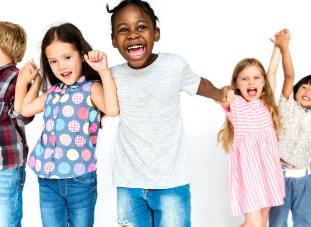 istock Group of kids celebrating and having fun 861180534