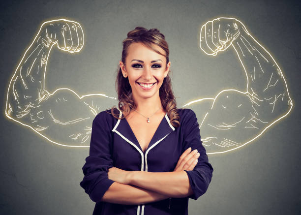 istock Strong happy woman on gray background 861184060