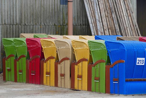 istock Hooded beach chairs in a row 861184252