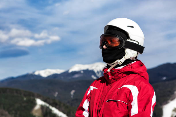 istock skier standing on top of a mountain 861184418