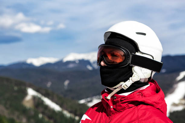istock skier standing on top of a mountain 861184512