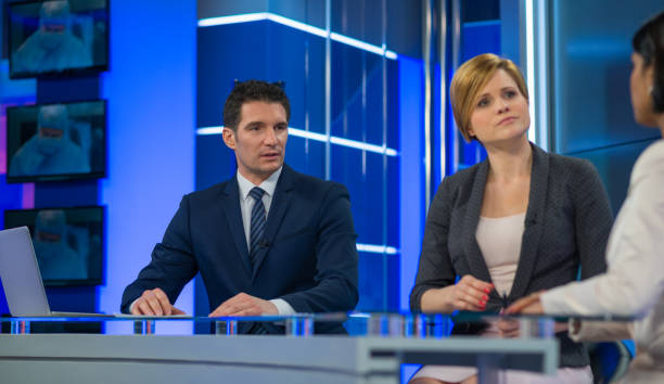 istock Journalists Sitting With Businesswoman 861184556