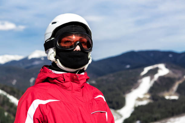 istock skier standing on top of a mountain 861184624