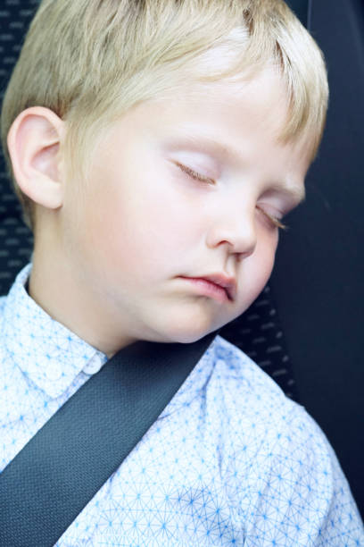 istock little boy in car safety seat 861190804