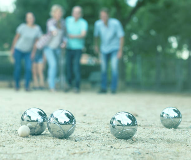 istock people playing petanque at leisure 861191198