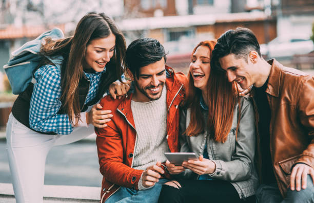istock Friends using a tablet in the city 861195212