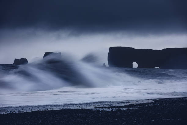 Long exposure wave at Reynisdrangar black sand beach near Vik.
