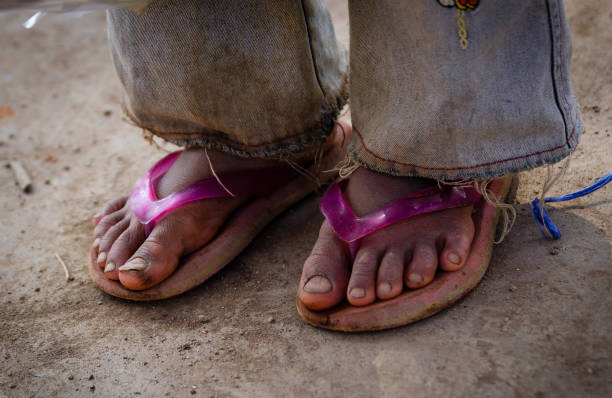 istock Poor children outside of shack 861214296