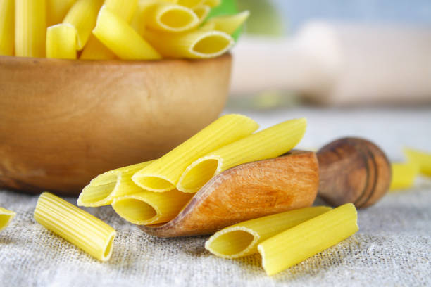 istock Penne rigate. Macaroni in the form of feathers. mostaccioli pasta 861236926