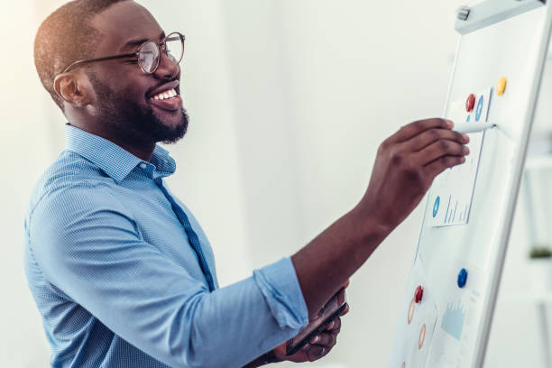 istock Radiant millennial employee preparing presentation in office 861247026
