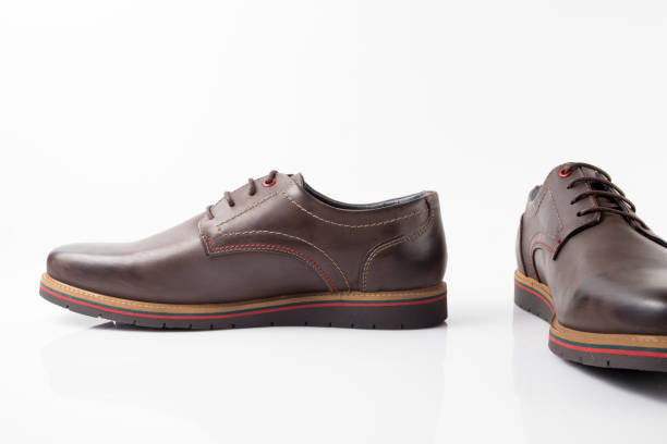 istock Male brown leather shoe on white background 861256236