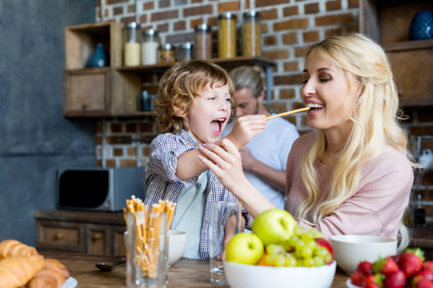 istock happy mother and son during breakfast 861263720