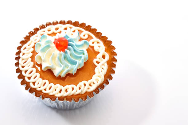 istock An isolated cupcake with sprinkles on a white background 861272318