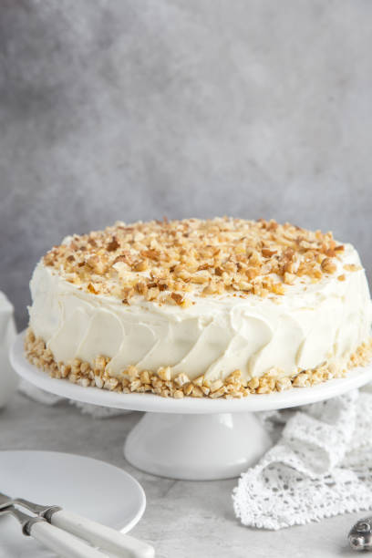 istock carrot cake with cream cheese frosting and nuts 861276896