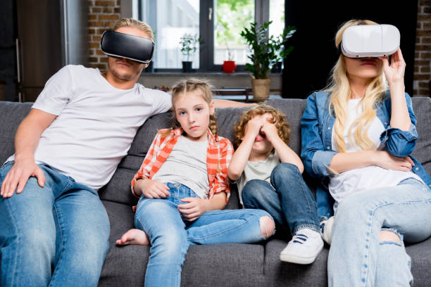 istock family in virtual reality headsets 861279632