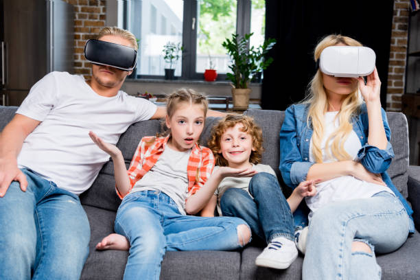istock family in virtual reality headsets 861279768