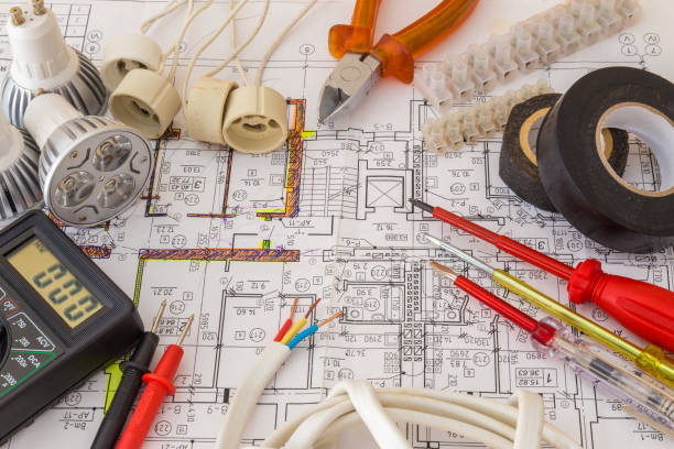 Still Life Of Electrical Components Arranged On Plans Still Life Of Electrical Components Arranged On Plans electrician photos stock pictures, royalty-free photos & images