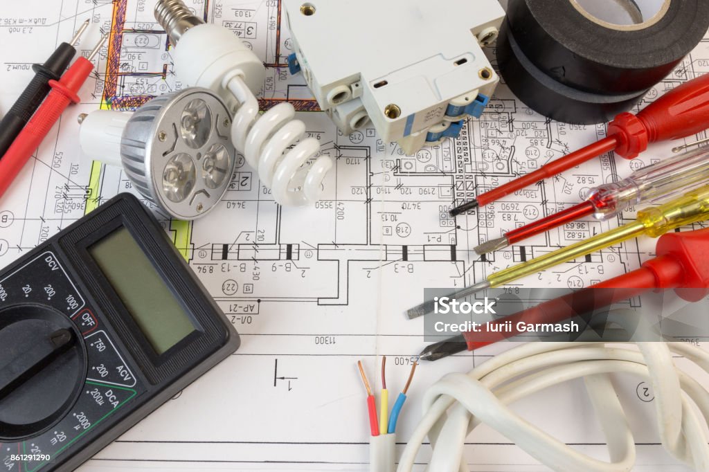 Still Life Of Electrical Components Arranged On Plans Electrician Stock Photo