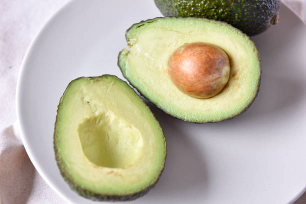 istock Closeup of fresh avocado on a plate. 861295584
