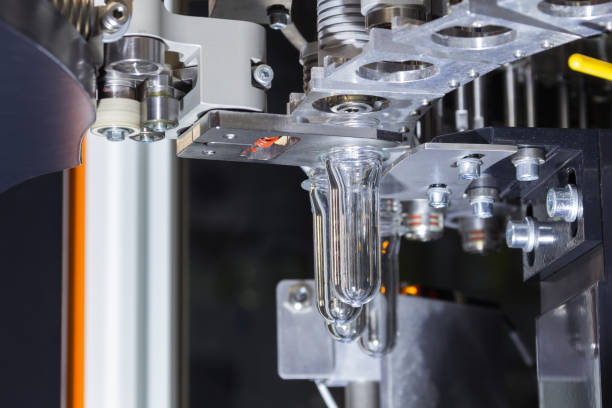 istock PET Preform in PET bottles blowing. 861303134