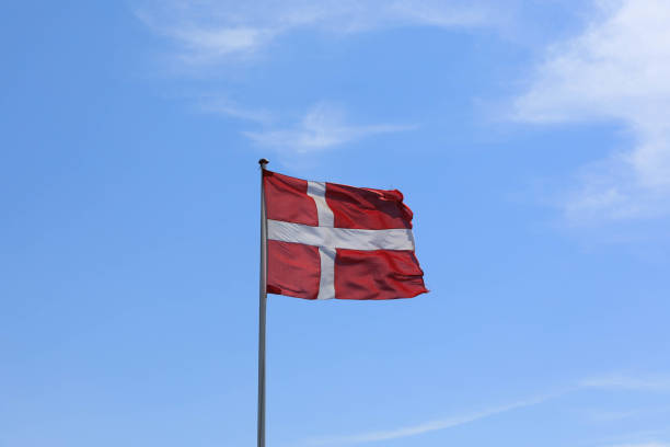 istock The Danish flag weaves in the wind. 861317438