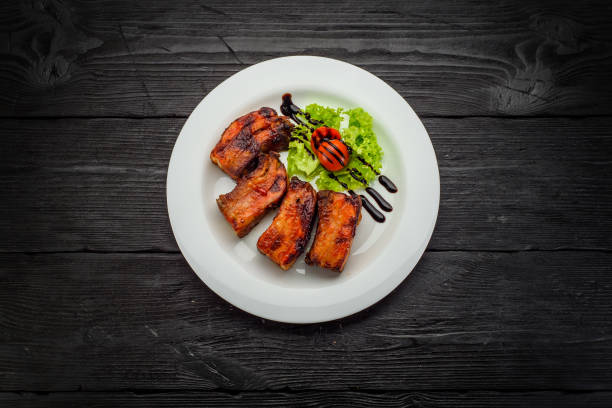 istock Grilled Fish Fillet over dark wooden background 861318278