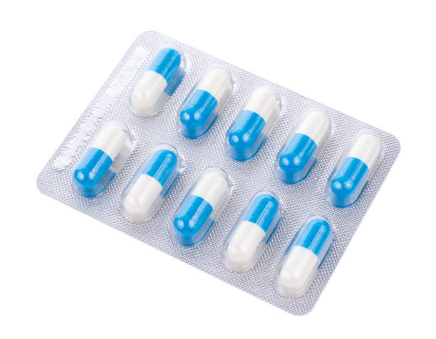 istock pills capsules isolated on white background 861319046