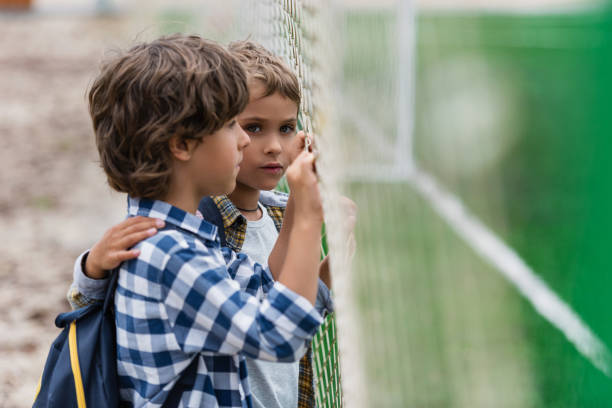 istock schoolboys on soccer field 861319052