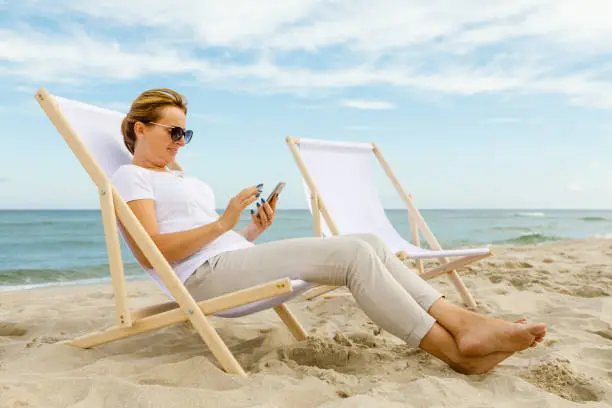 Photo of Woman relaxing on beach