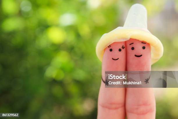 Fingers Art Of Happy Couple Concept Of Safe Sex Stock Photo - Download Image Now - Condom, Contraceptive, Love - Emotion