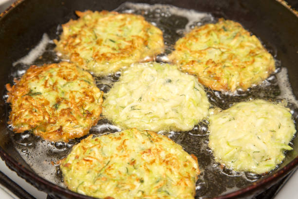istock Fritters are fried in oil in a frying pan 861333464