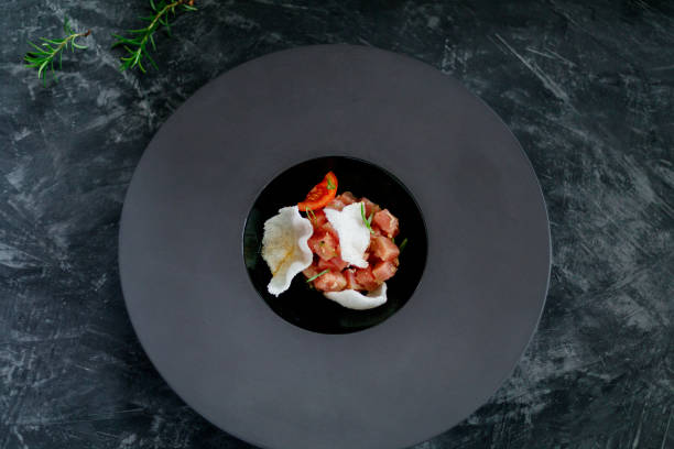 istock Tuna salad with chips in a black plate 861333724