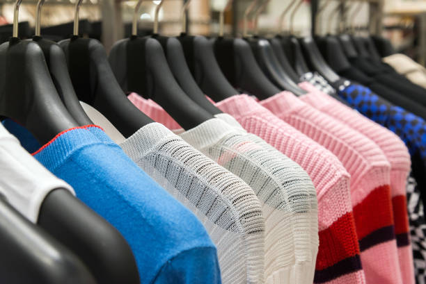 istock Womens sweaters on hanger in the store 861345618