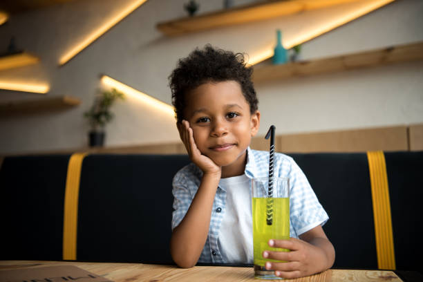 istock african american child drinking lemonade 861355618